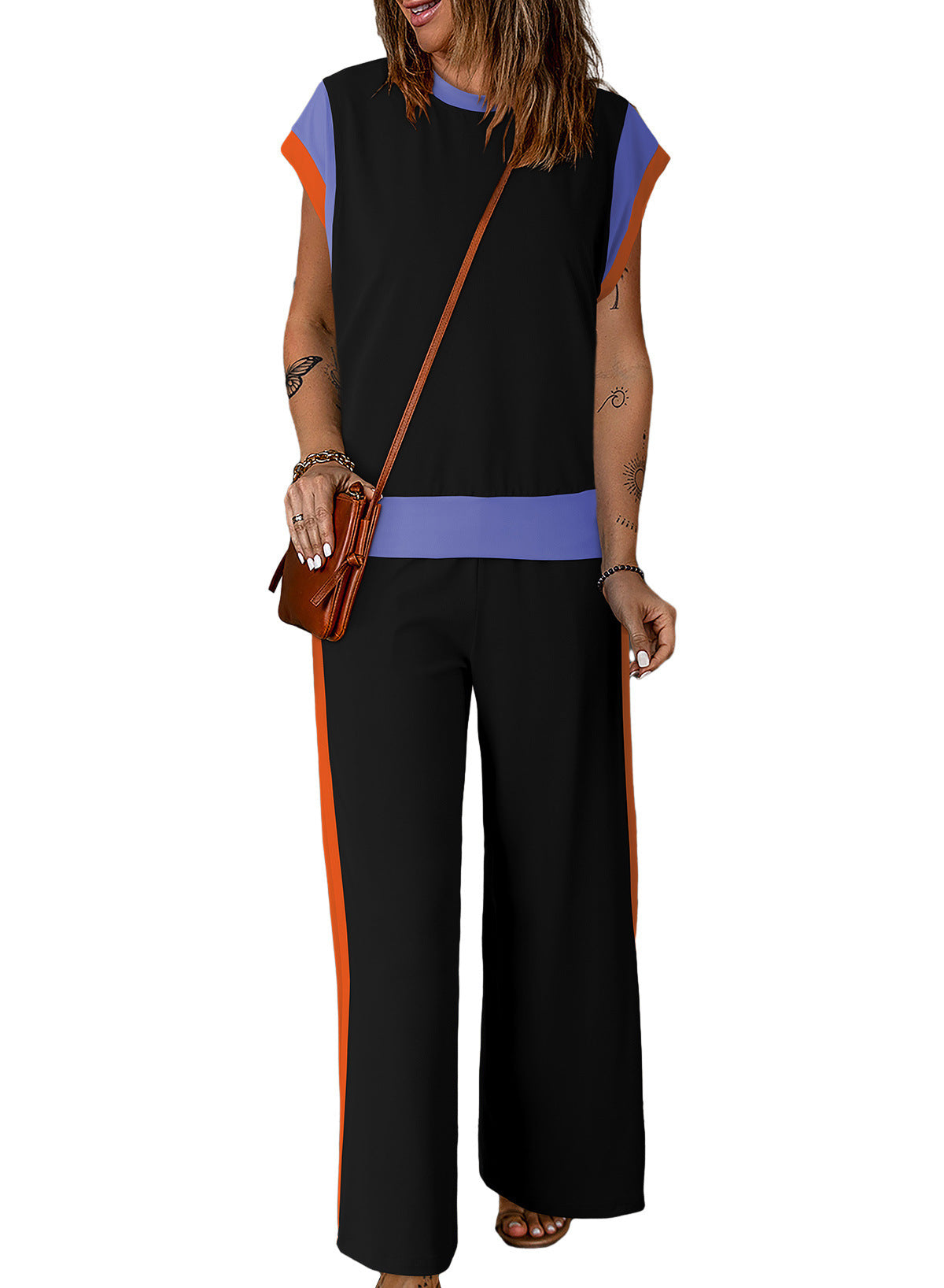 Conjunto de dos piezas de camiseta y pantalones holgados de manga corta con cuello redondo y bloques de color para mujer