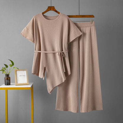 Conjunto de dos piezas de pantalón ancho y top irregular de color liso informal a la moda para mujer