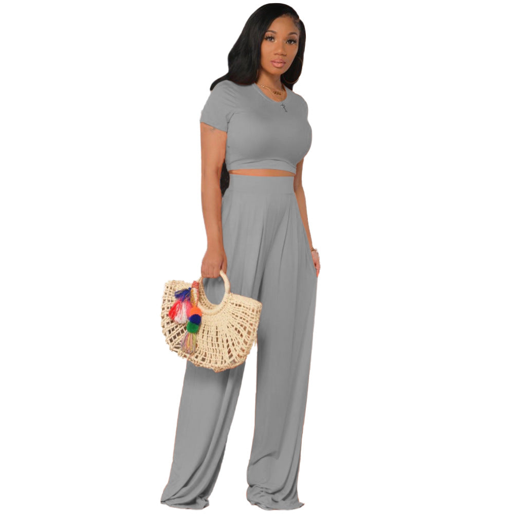 Conjunto de dos piezas de top corto y pantalón de color liso, manga corta, color naranja, informal y vanguardista para mujer