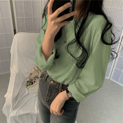 Camiseta informal de manga larga con cuello redondo y color liso para mujer