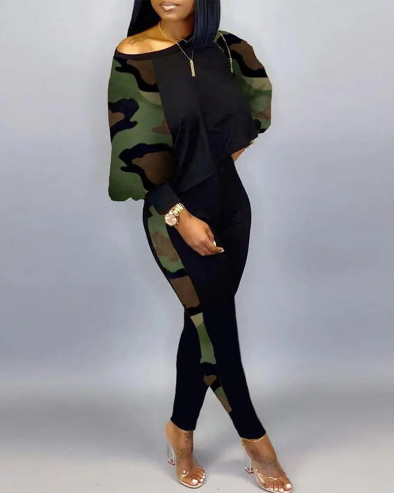 Conjunto de top holgado y pantalones ajustados con estampado gráfico informal de moda para mujer