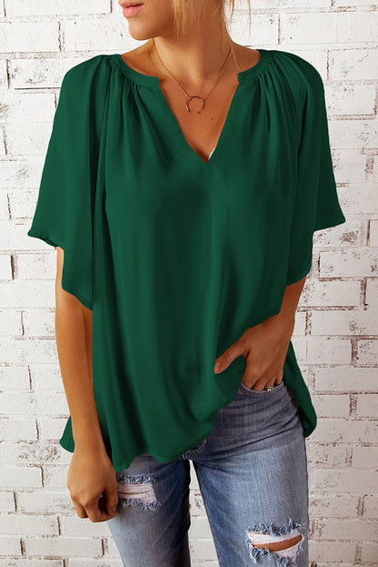 Blusa informal holgada de color liso con cuello en V y manga corta para mujer