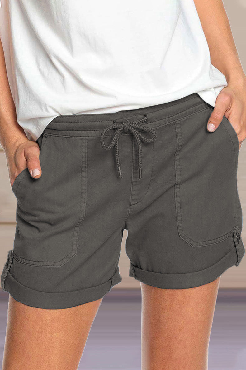 Pantalones cortos casuales de cintura elástica de color sólido a la moda para mujer