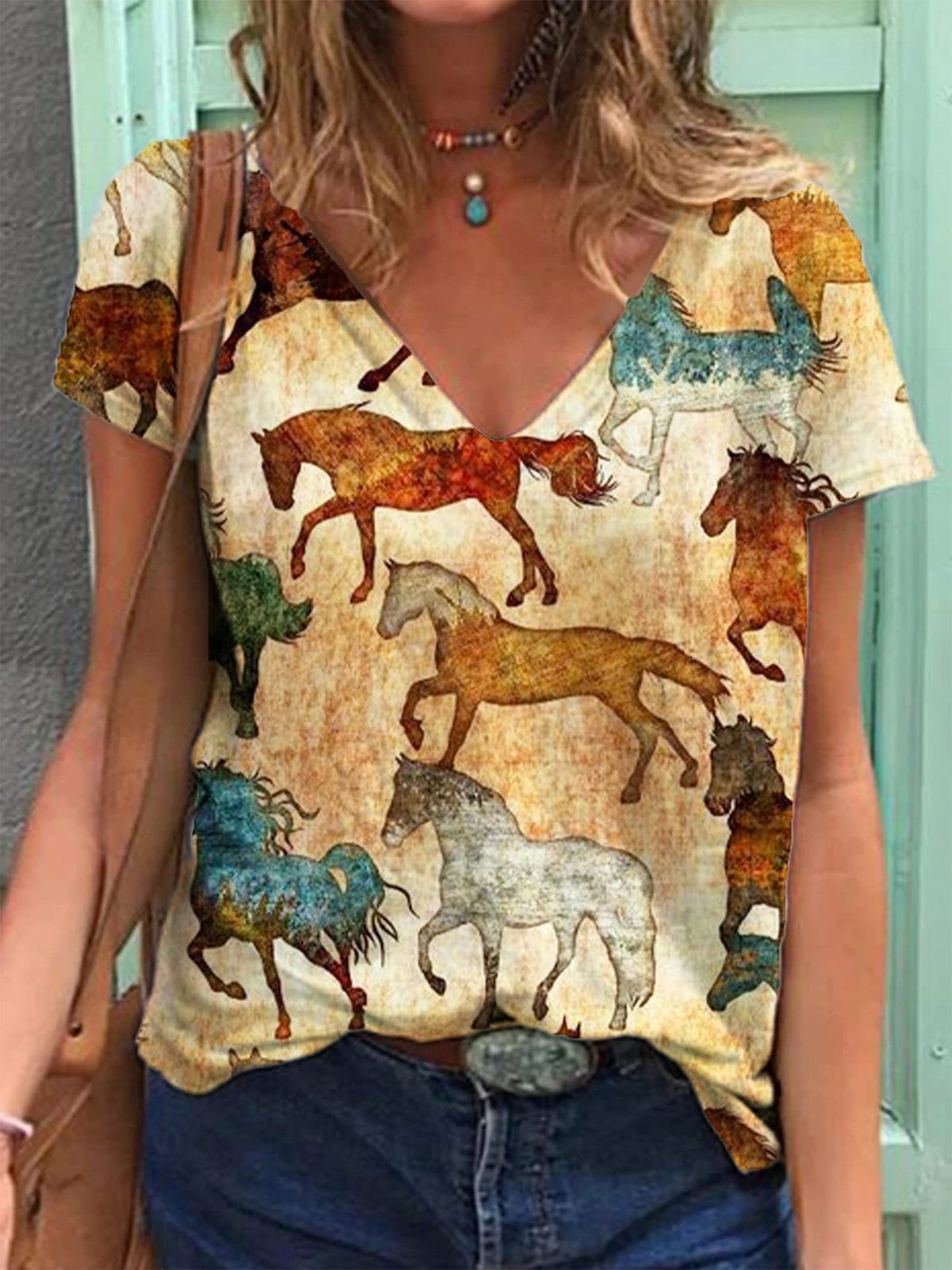 Camiseta informal holgada con cuello en V y manga corta para mujer