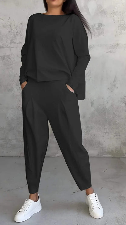 Conjunto de dos piezas de top y pantalón de manga larga con cuello redondo y color liso para mujer