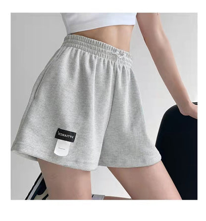 Pantalones cortos casuales de pierna ancha de color liso para mujer