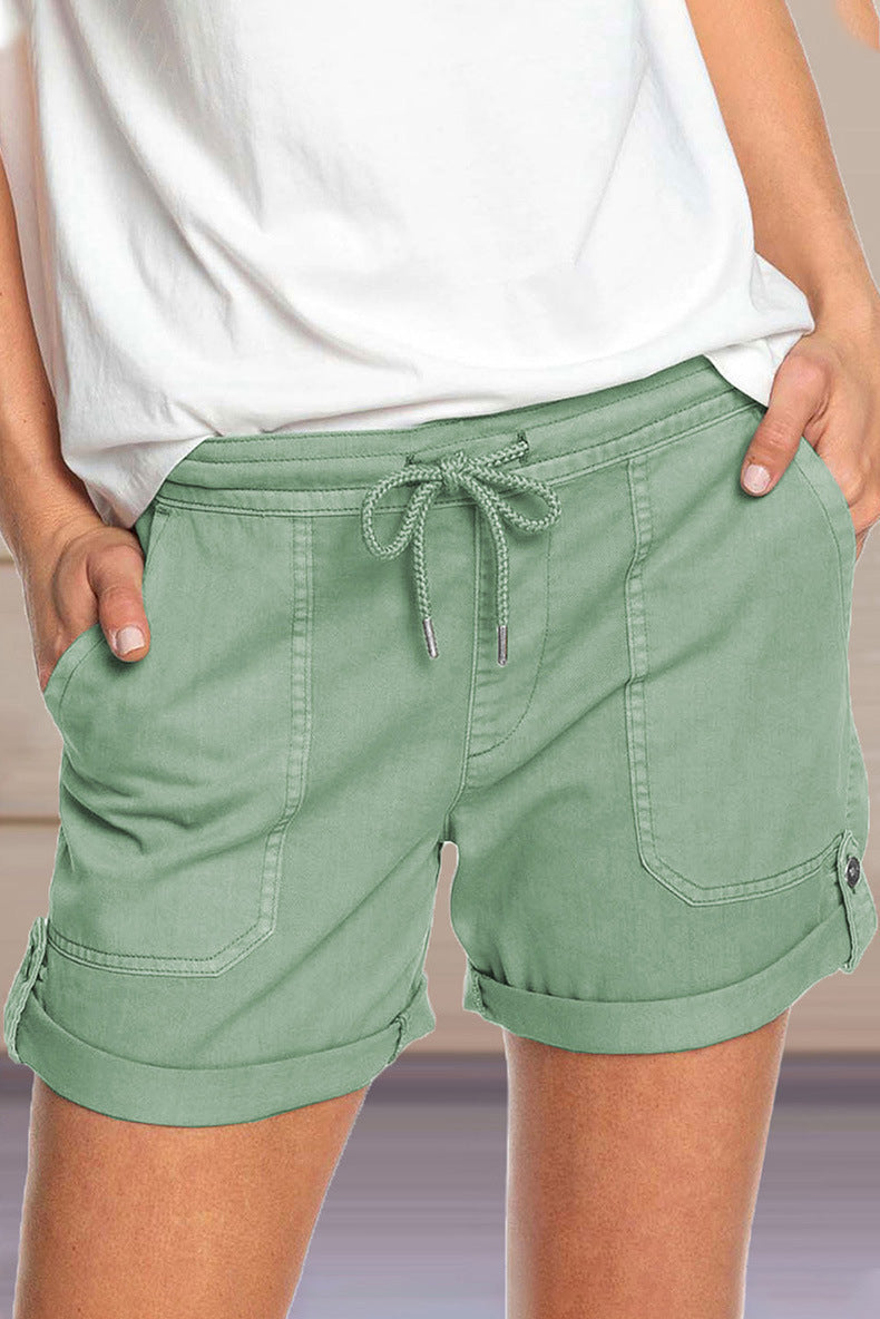 Pantalones cortos casuales de cintura elástica de color sólido a la moda para mujer