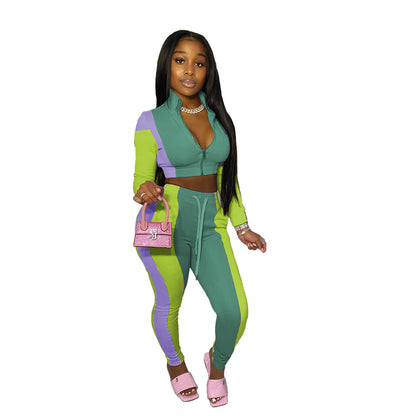 Conjunto deportivo informal de dos piezas para mujer: top corto con cremallera y pantalones ajustados con bloques de color