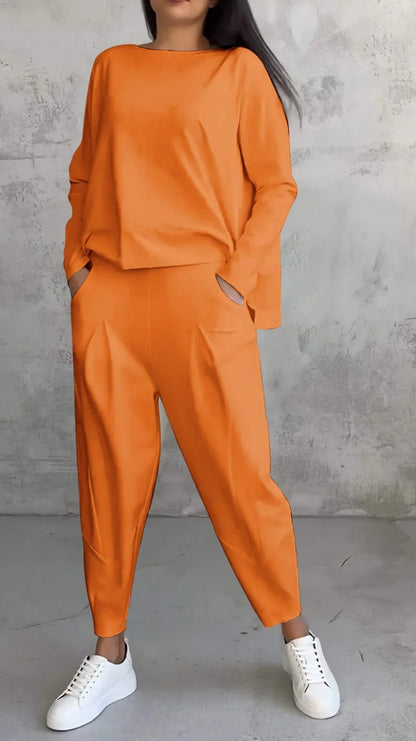 Conjunto de dos piezas de top y pantalón de manga larga con cuello redondo y color liso para mujer