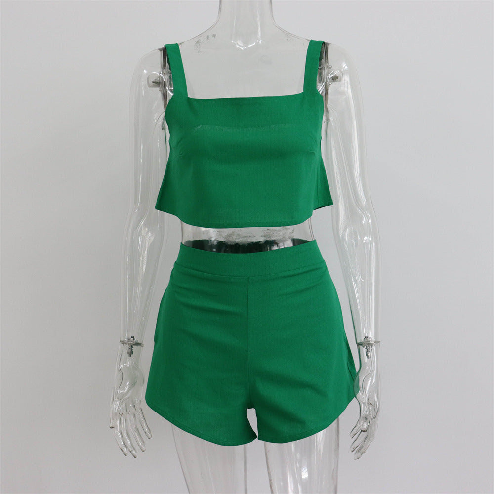 Conjunto de dos piezas de camiseta sin mangas y pantalones cortos de color liso para mujer