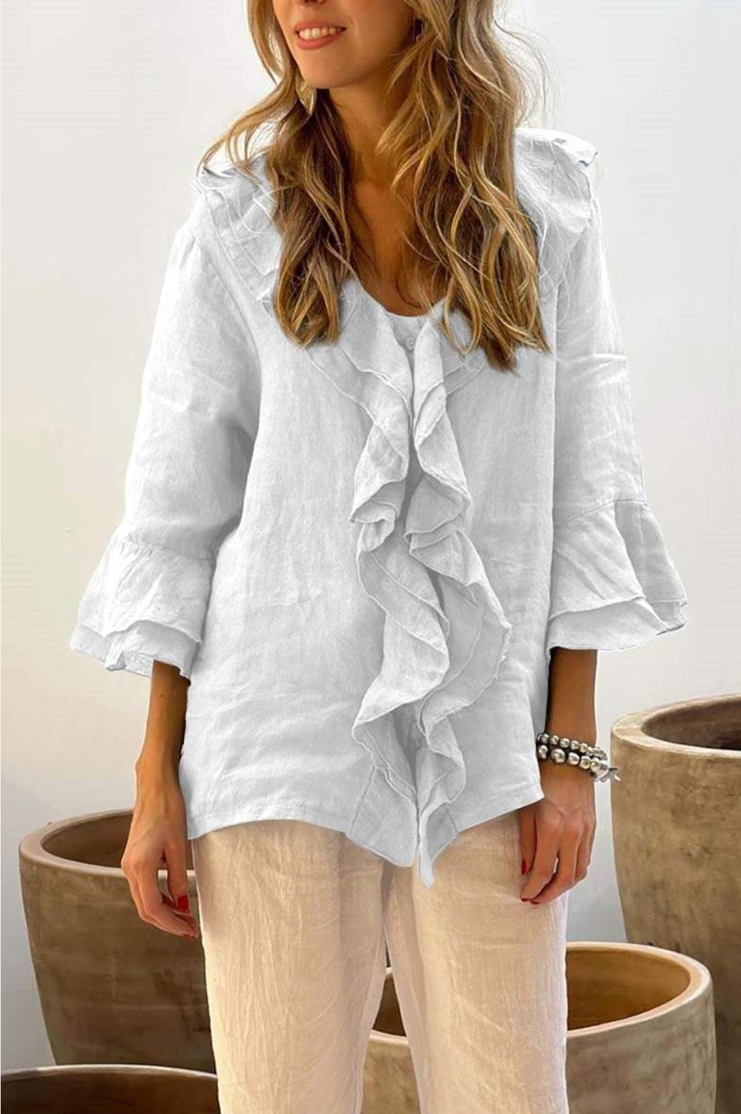 Blusa holgada informal de manga larga con volantes y escote en V de color liso para mujer