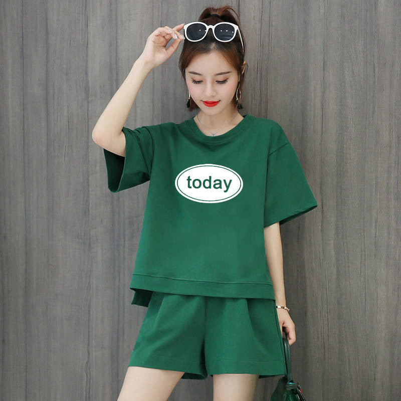 Conjunto de 2 piezas de camiseta de manga corta con cuello redondo, pantalones cortos y cintura definida, estampado de color liso y holgado para mujer