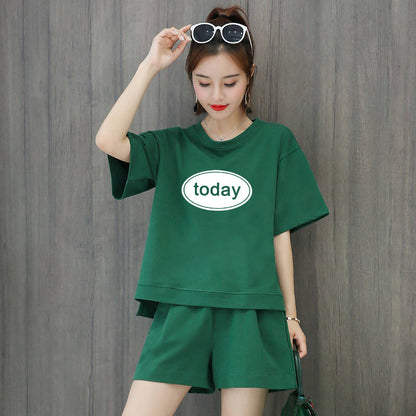 Conjunto de 2 piezas de camiseta de manga corta con cuello redondo, pantalones cortos y cintura definida, estampado de color liso y holgado para mujer