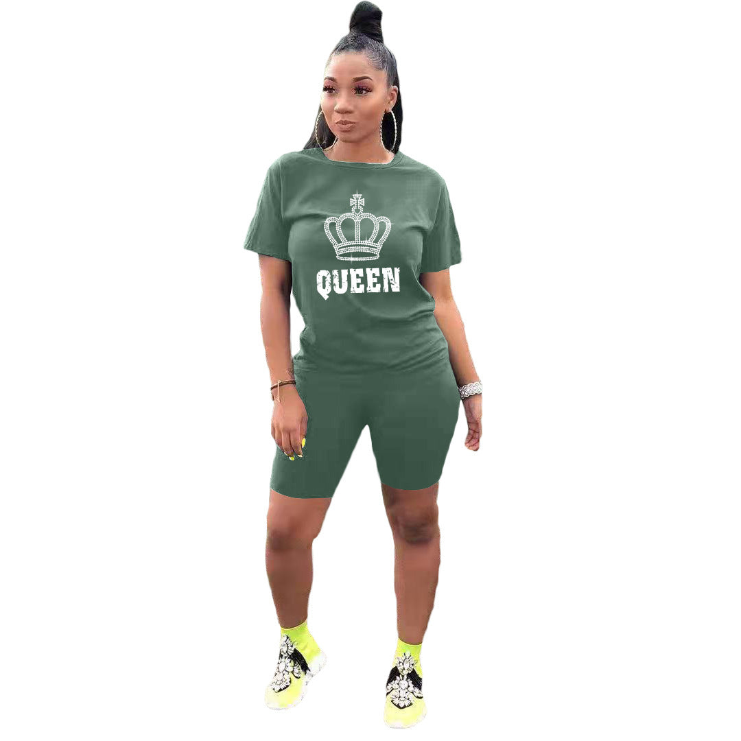 Conjunto deportivo informal de dos piezas para mujer: camiseta de manga corta con cuello redondo y pantalones cortos de color liso