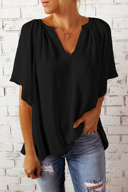 Blusa informal holgada de color liso con cuello en V y manga corta para mujer