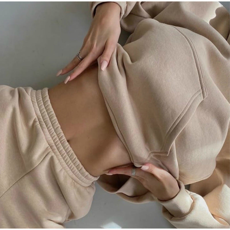 Conjunto deportivo informal de dos piezas con capucha y pantalones de manga larga de color liso para mujer