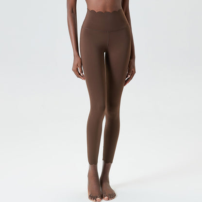 Leggings de yoga ajustados de cintura alta y secado rápido con pegamento líquido y ondas pequeñas de color sólido para mujer