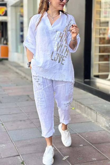 Conjunto de dos piezas de blusa y pantalones holgados con cuello en V y media manga para mujer