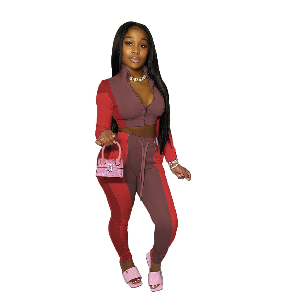 Conjunto deportivo informal de dos piezas para mujer: top corto con cremallera y pantalones ajustados con bloques de color