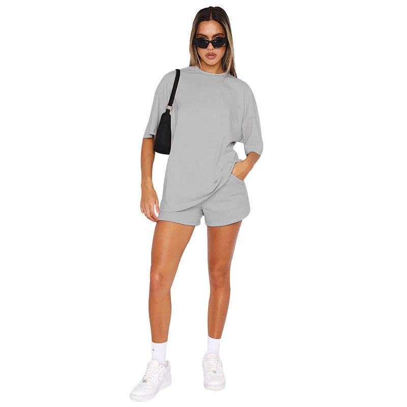 Conjunto de dos piezas de pantalones cortos de manga corta de color liso informal a la moda para mujer