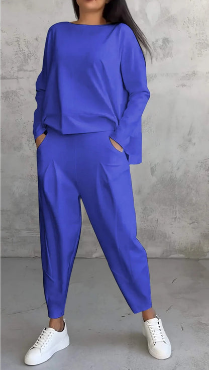 Conjunto de dos piezas de top y pantalón de manga larga con cuello redondo y color liso para mujer