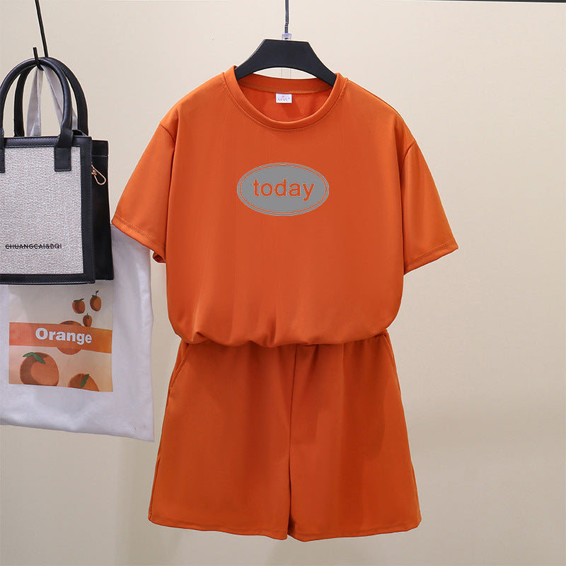 Conjunto de 2 piezas de camiseta de manga corta con cuello redondo, pantalones cortos y cintura definida, estampado de color liso y holgado para mujer