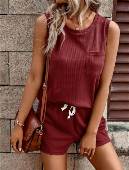 Conjunto de dos piezas formado por top y pantalón corto, sin mangas, cuello redondo, color liso, informal, para mujer, verano
