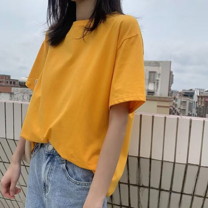 Camiseta básica holgada informal de color liso con cuello redondo para mujer