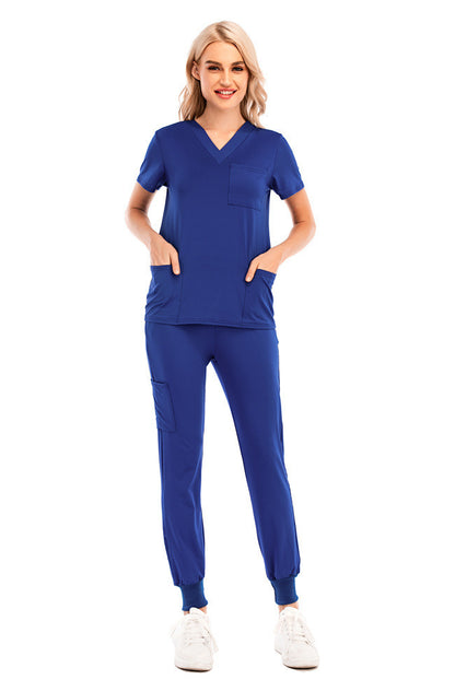 Conjunto de enfermera informal de color sólido con cuello en V, manga corta y bolsillo