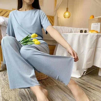 Conjunto de dos piezas de top y pantalón de manga corta de seda helada informal de verano para mujer
