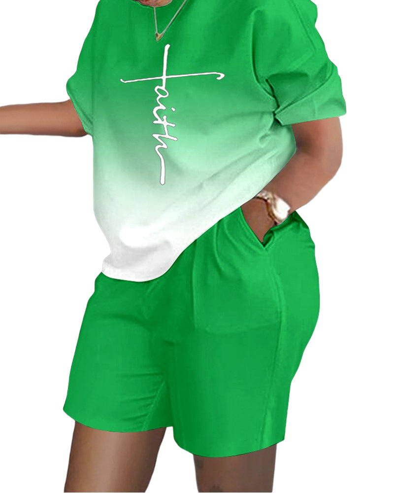 Conjunto de dos piezas de top y pantalones cortos de manga corta con cuello redondo y estampado gráfico informal para mujer