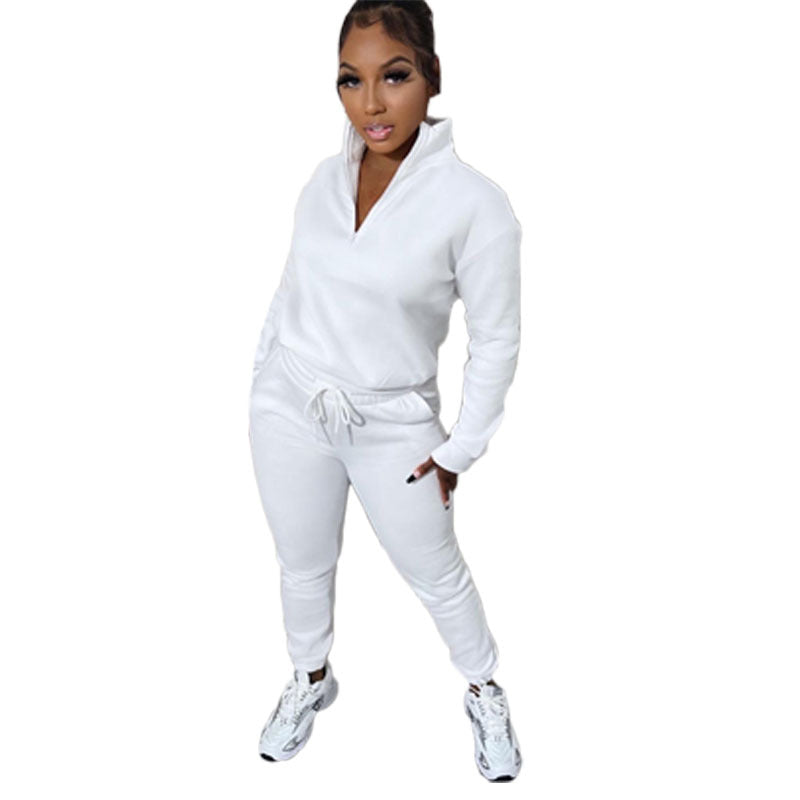 Conjunto deportivo informal de dos piezas para mujer, sudadera y pantalones de manga larga con cremallera y cuello alto en color liso