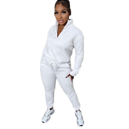 Conjunto deportivo informal de dos piezas para mujer, sudadera y pantalones de manga larga con cremallera y cuello alto en color liso