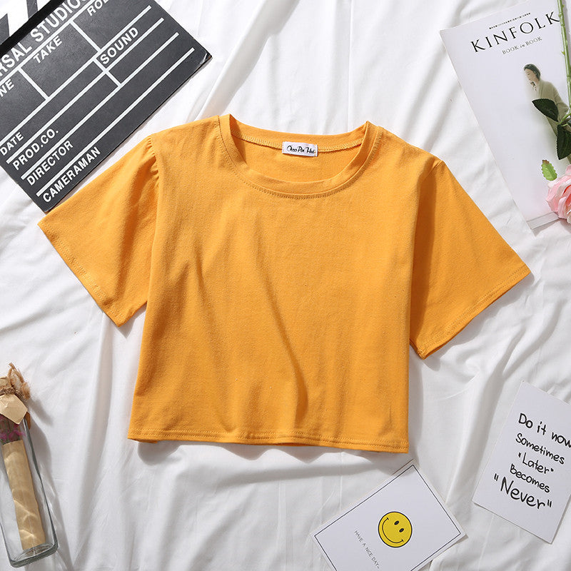 Camiseta básica de verano para mujer, de manga corta, color liso, con cuello redondo y cintura alta, informal, holgada