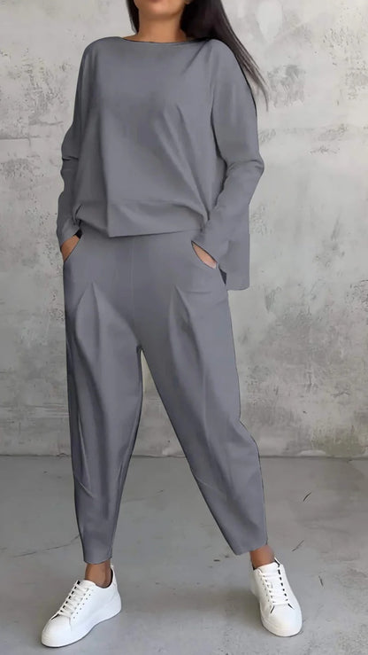 Conjunto de dos piezas de top y pantalón de manga larga con cuello redondo y color liso para mujer
