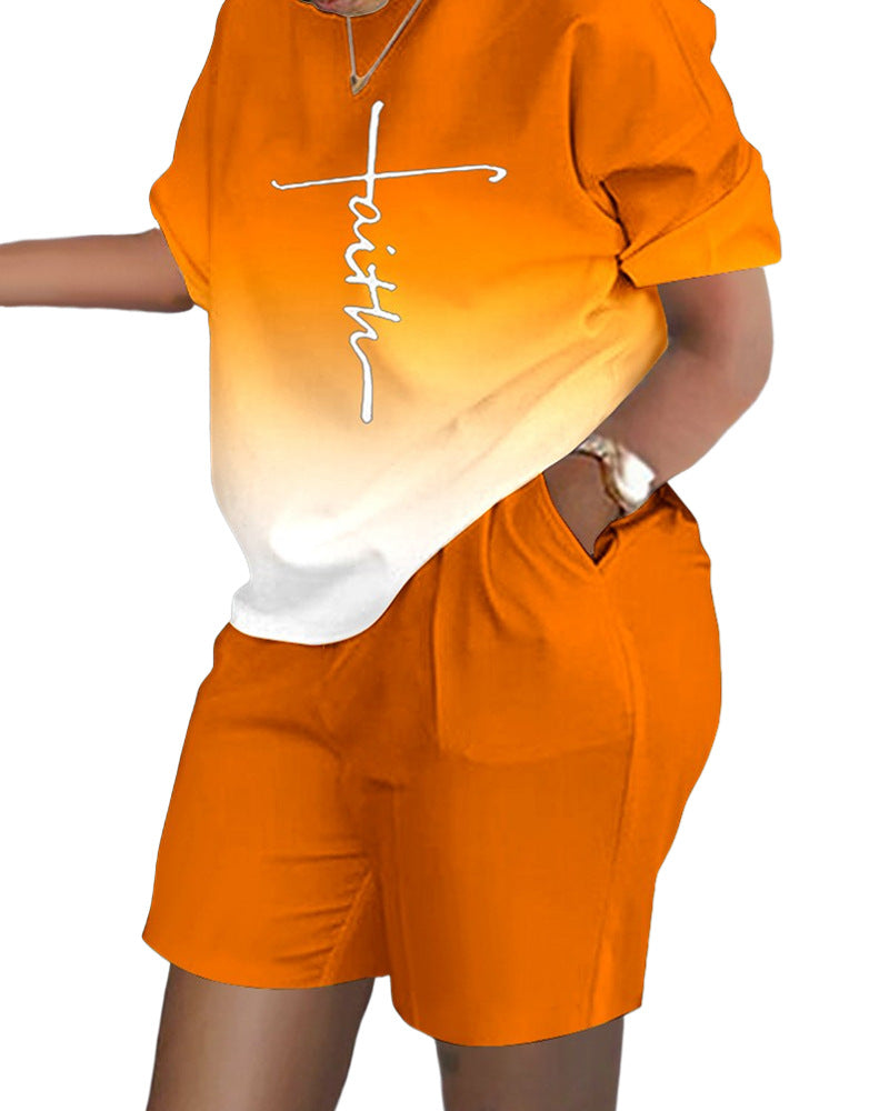Conjunto de dos piezas de top y pantalones cortos de manga corta con cuello redondo y estampado gráfico informal para mujer