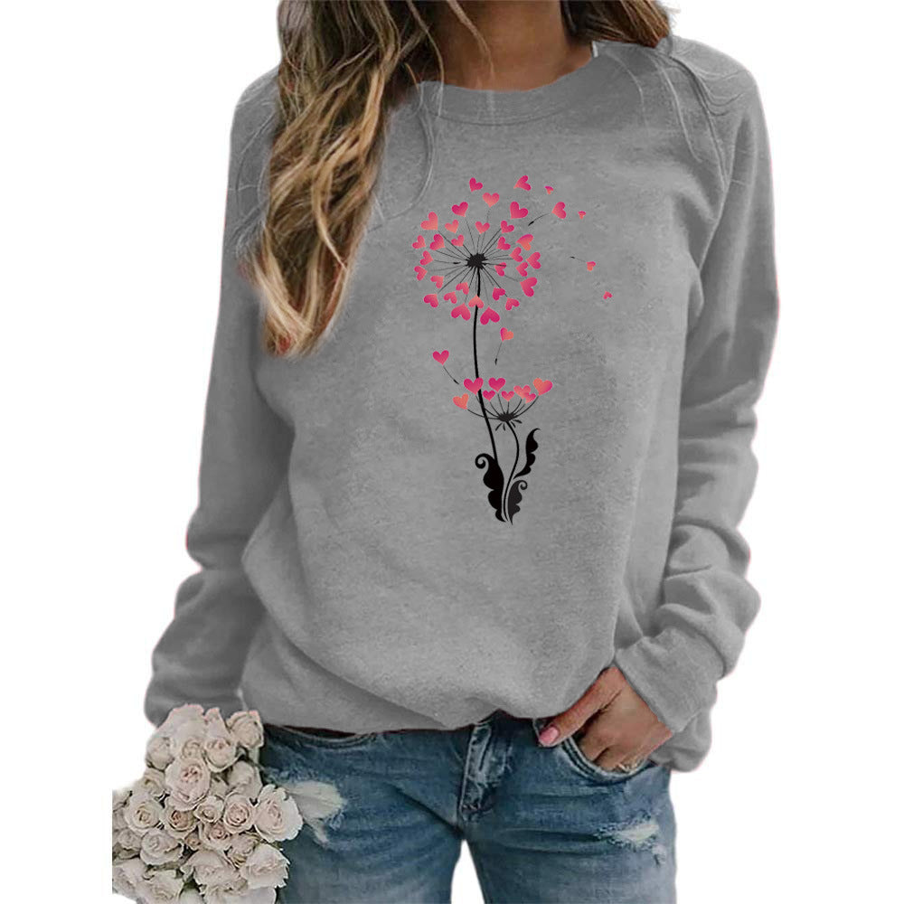 Sudadera holgada informal con estampado de diente de león y corazón para mujer, cuello redondo y manga larga