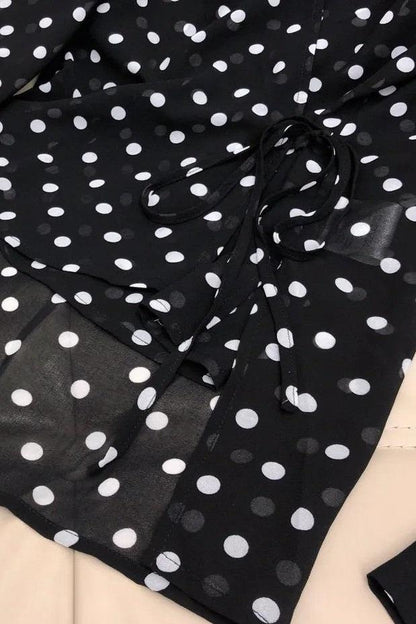 Blusa de manga larga con lunares Gilda