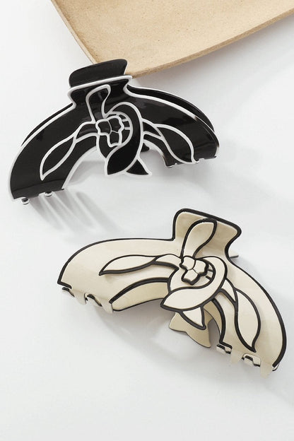 Pinza para el cabello con diseño de línea de contraste de flor de magnolia
