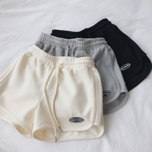 Pantalones cortos deportivos casuales de cintura alta y pierna ancha para mujer