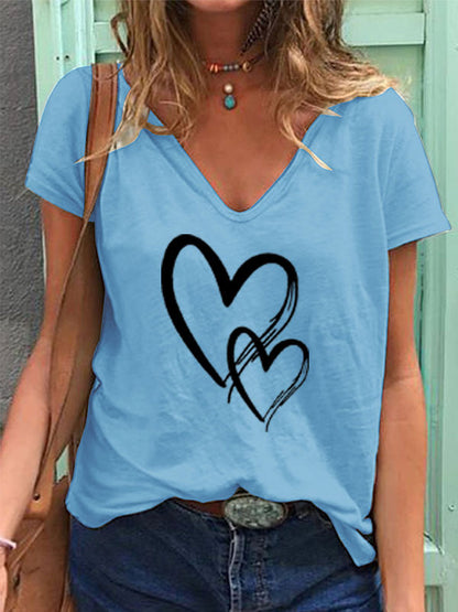 Camiseta informal de manga corta con cuello en V y estampado de corazón para mujer