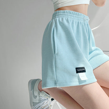 Pantalones cortos casuales de pierna ancha de color liso para mujer