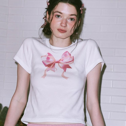 Camiseta informal de manga corta con cuello redondo y estampado de lazo de color liso para mujer