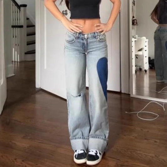 Vaqueros rectos de cintura baja con costura lateral y corazón para mujer