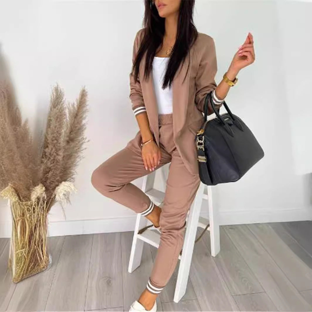 Conjunto de dos piezas formado por chaqueta y pantalón, manga larga, color liso, informal, a la moda para mujer