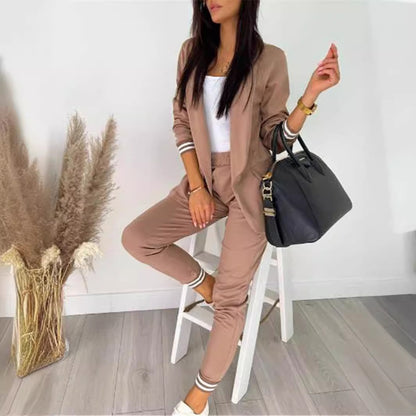 Conjunto de dos piezas formado por chaqueta y pantalón, manga larga, color liso, informal, a la moda para mujer