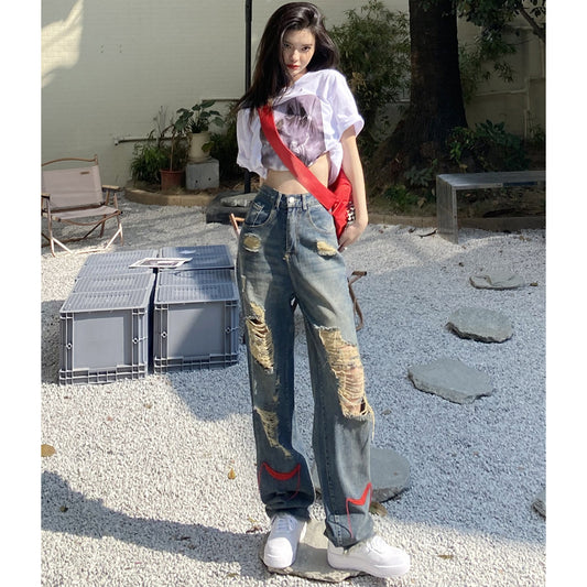 Vaqueros rotos de cintura alta estilo retro para mujer, estilo casual y moderno.