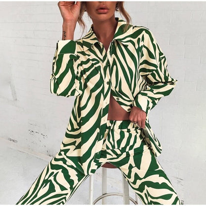 Conjunto de blusa y pantalón de manga larga con estampado de rayas informales a la moda para mujer
