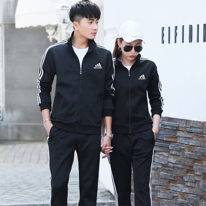 Conjunto deportivo informal para hombre y mujer con sudadera y pantalones de chándal con cremallera y estampado de rayas en contraste para pareja