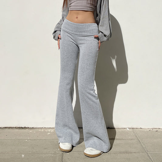 Pantalones acampanados de cintura baja de color liso informales a la moda para mujer